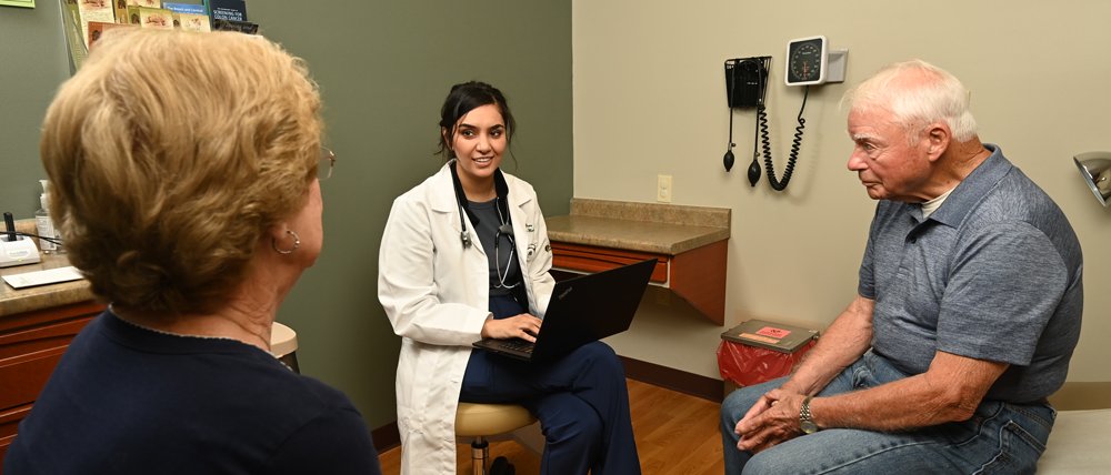 a rural family medicine residency student with patients