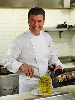 head chef preparing pasta