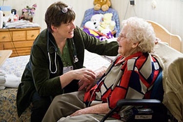 photo of a physician and patient