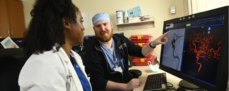 neurology resident students looking at images