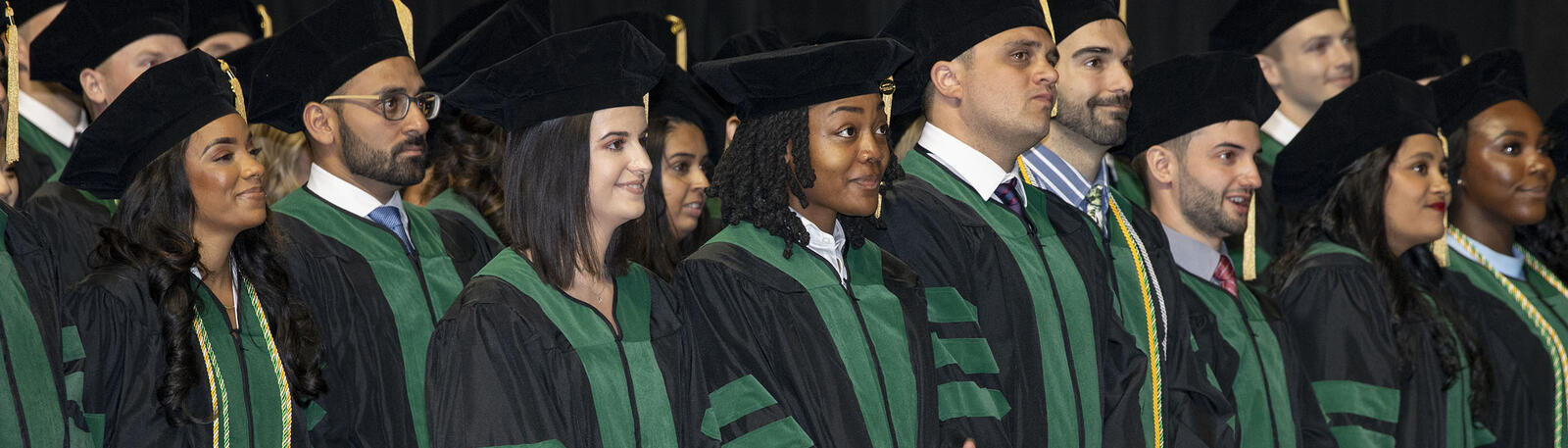 photo of happy graduates at commencement