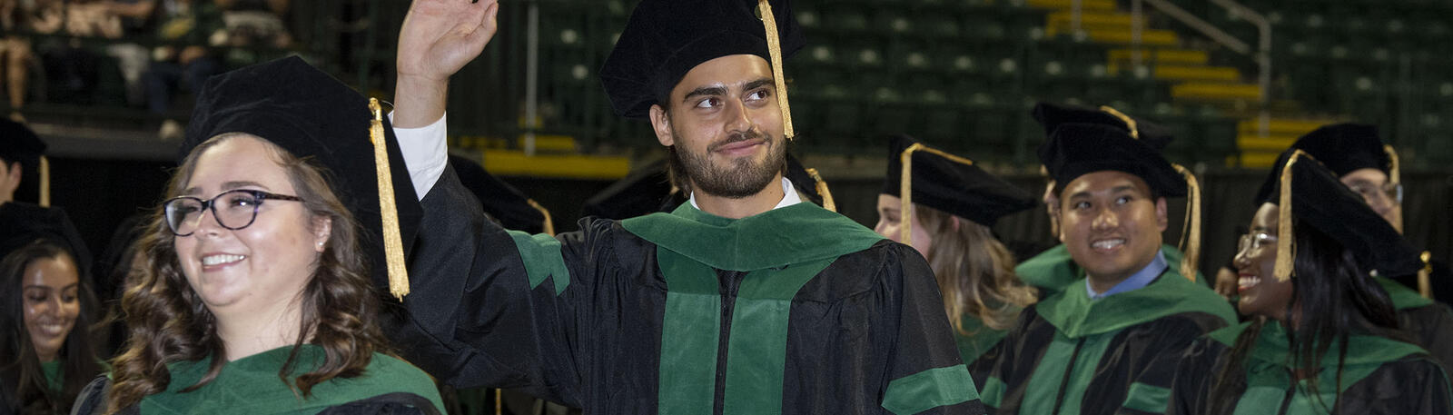 photo of happy graduates at commencement