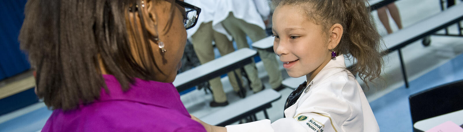 photo of a medical student and child