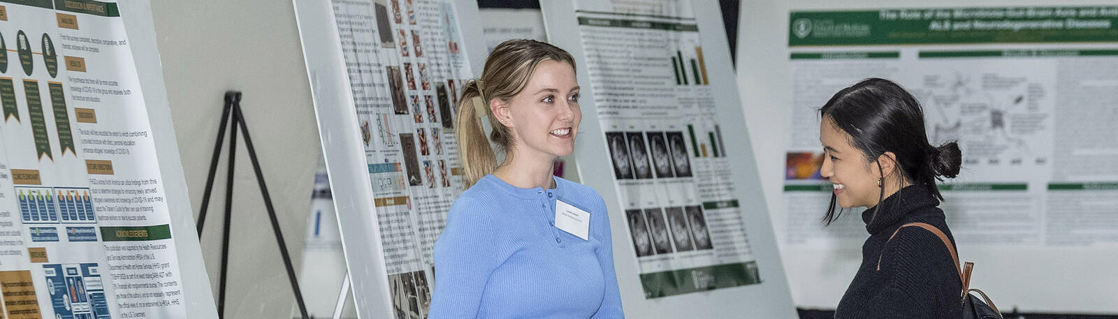 photo of students at a poster presentation