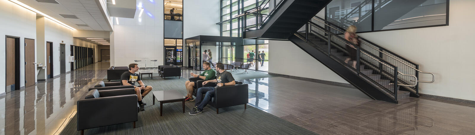 photo of students in the nec building