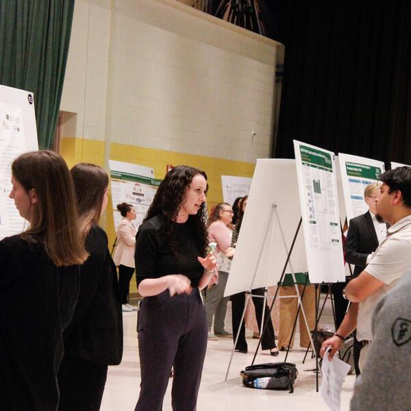 audience viewing poster presentations