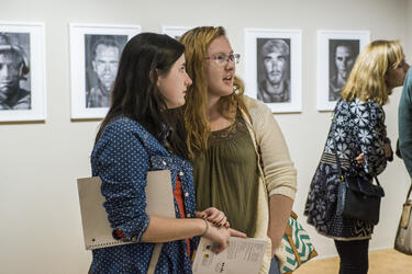 photo of people at an exhibit in the art galleries