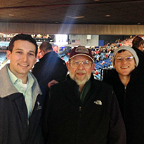 Dan and Rufus with Dr. Binski at a University of Dayton Basketball gam